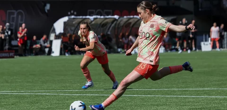 Player kicking ball during Kansas City vs Portland match