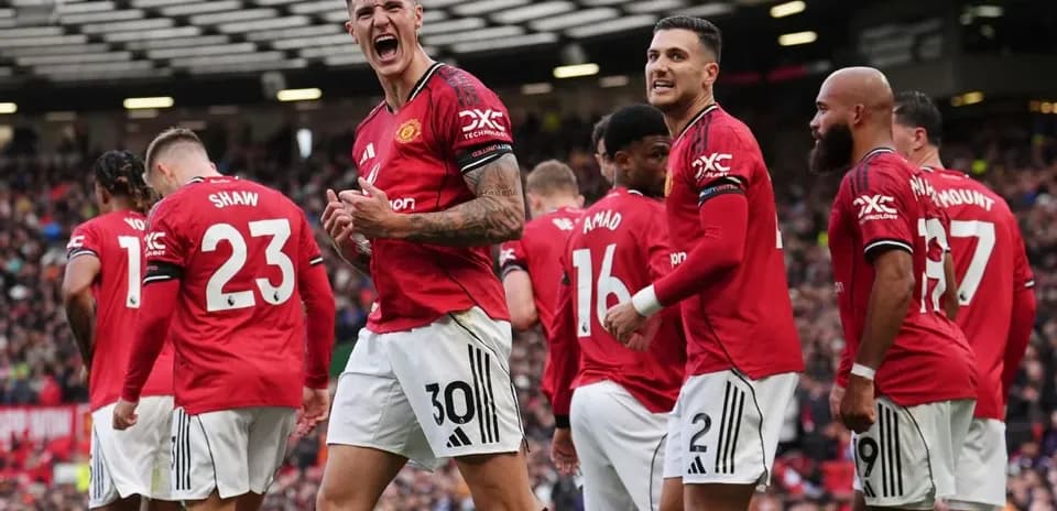 Manchester United players celebrating a goal
