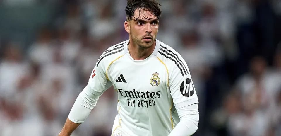 Player in Real Madrid kit during match action