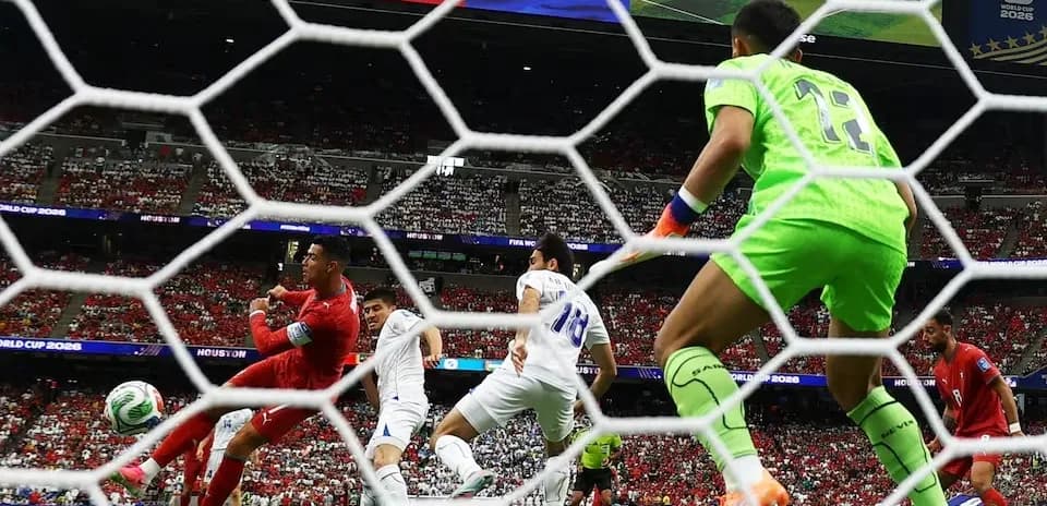 Goalkeeper saving shot during FIFA World Cup match