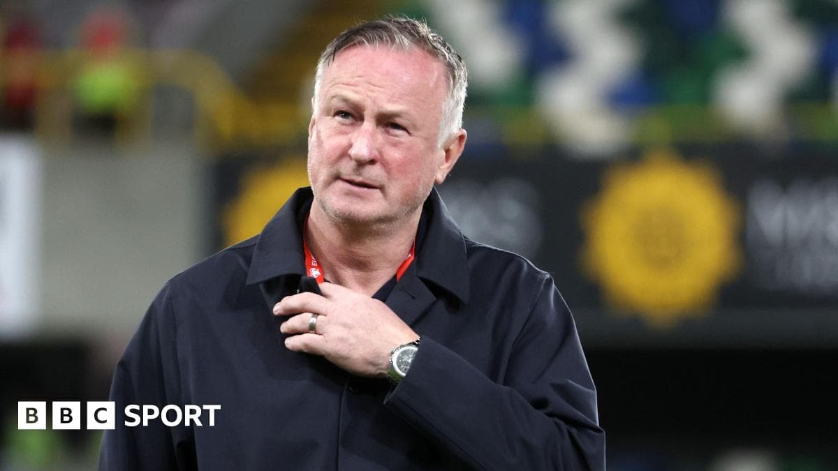 Manager on the pitch during a match