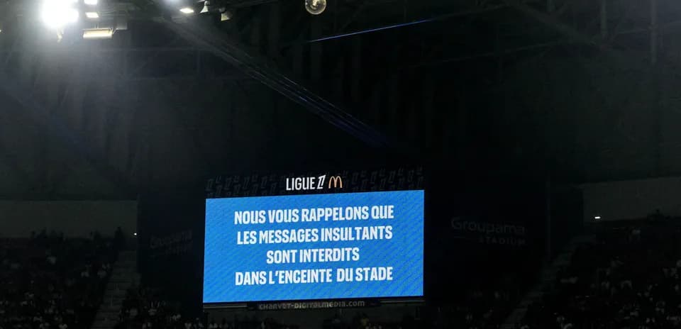 Message board warning against insulting remarks at stadium
