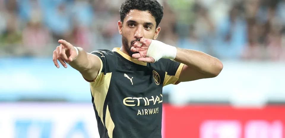 Player celebrating and pointing during a match