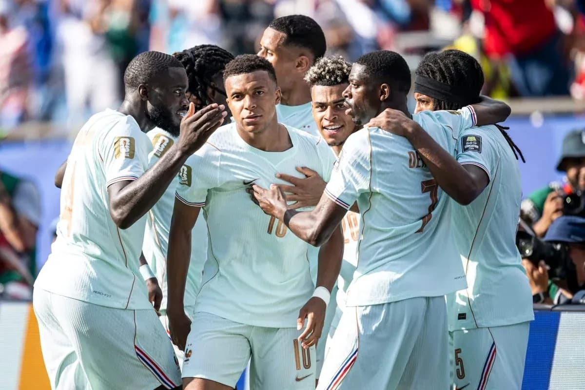 Players celebrating a goal during a match