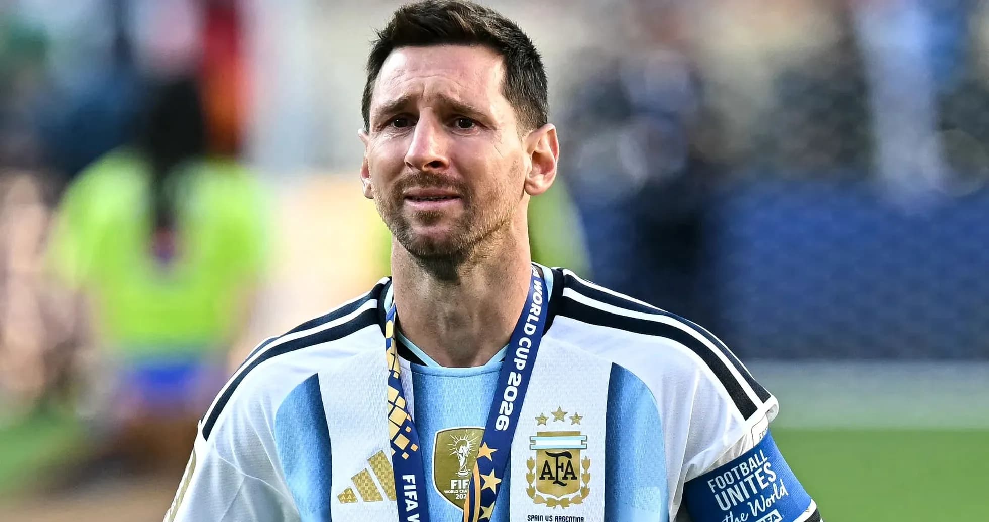 Player wearing Argentina jersey with World Cup medal