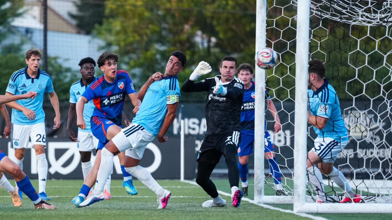 Players contesting a goal during FC Cincinnati II match