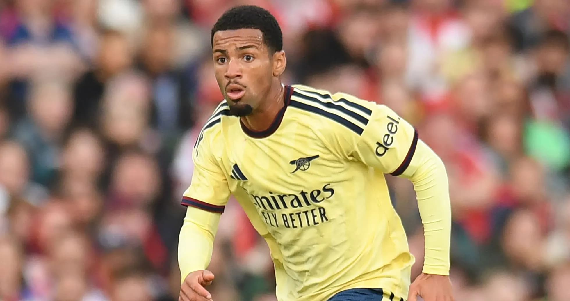 Player in Arsenal kit running during match