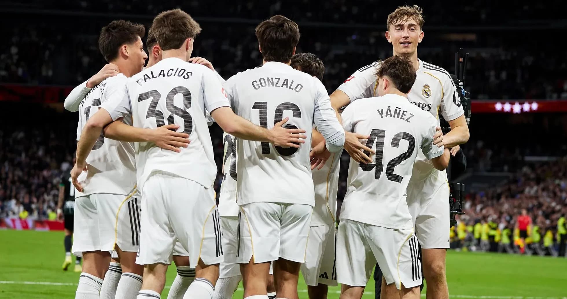 Real Madrid players celebrating a goal