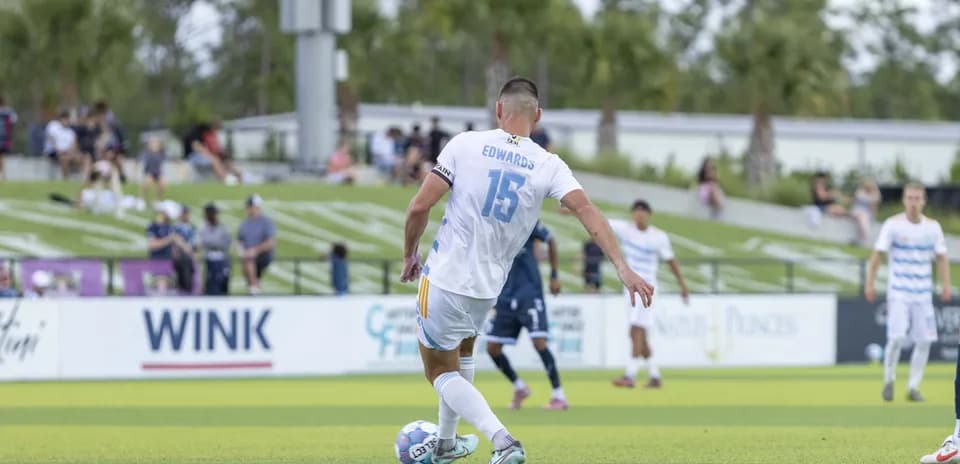 Player kicking ball during JAX vs Brooklyn match