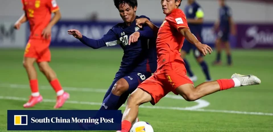 Players from China and Japan contesting the ball