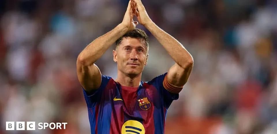 Player applauding fans after match at stadium