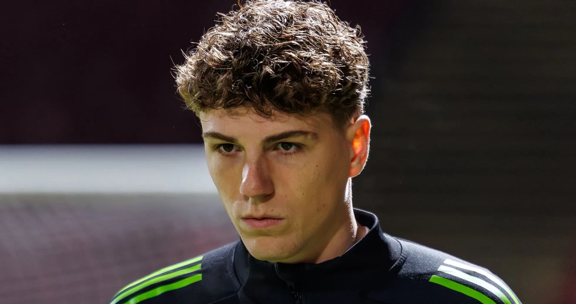 Player in training gear looking focused before match