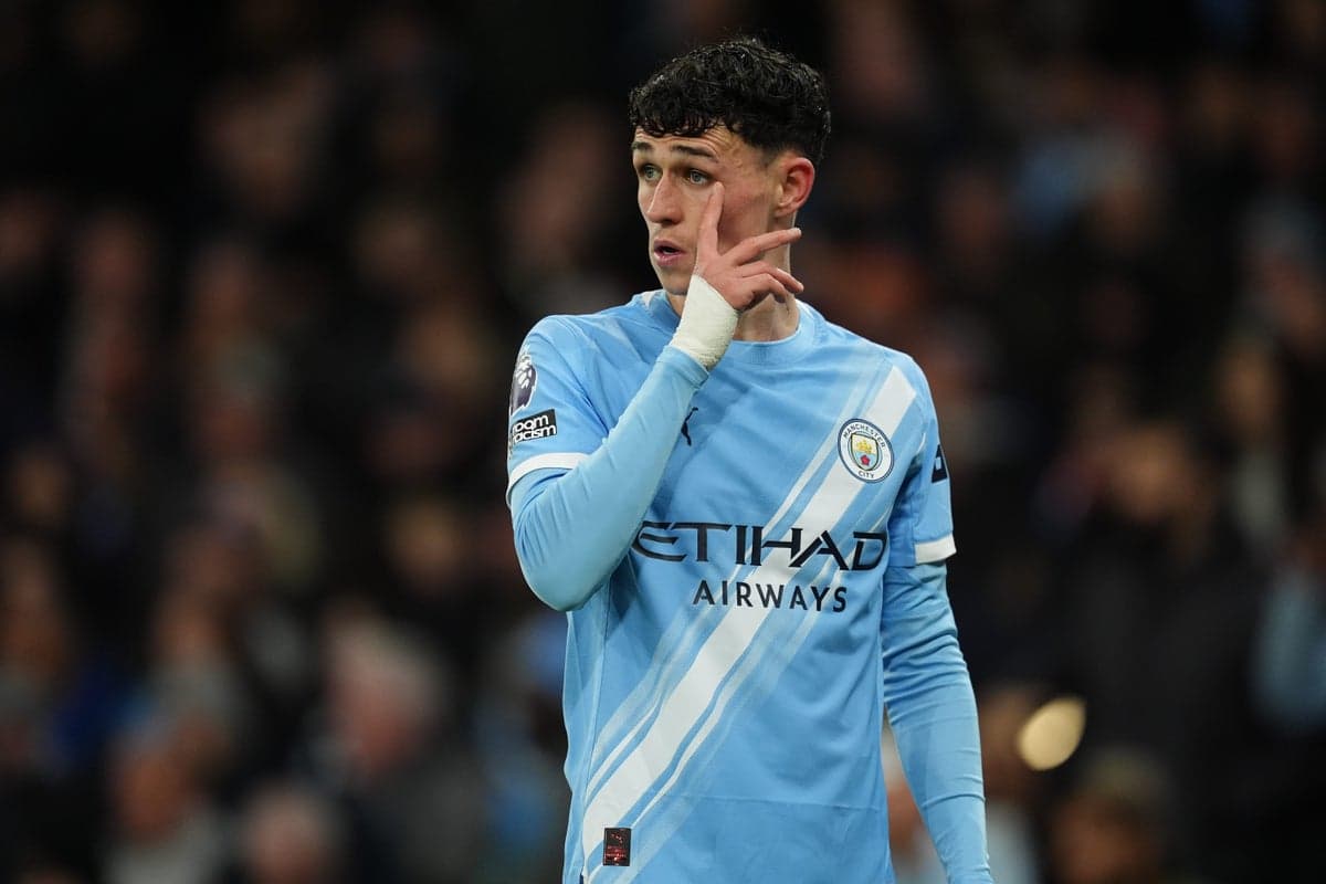 Player gesturing during match in light blue kit