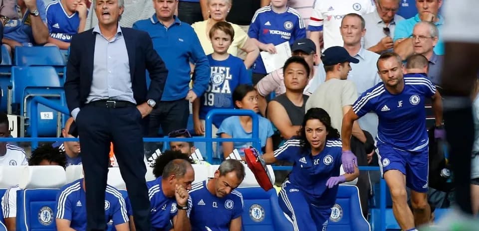 Chelsea staff and fans during match at Stamford Bridge