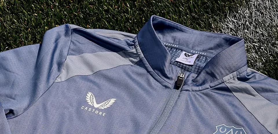 Everton training jacket on grass field