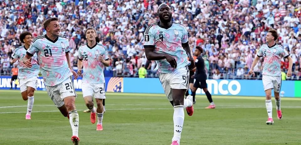 Players celebrating a goal during a match