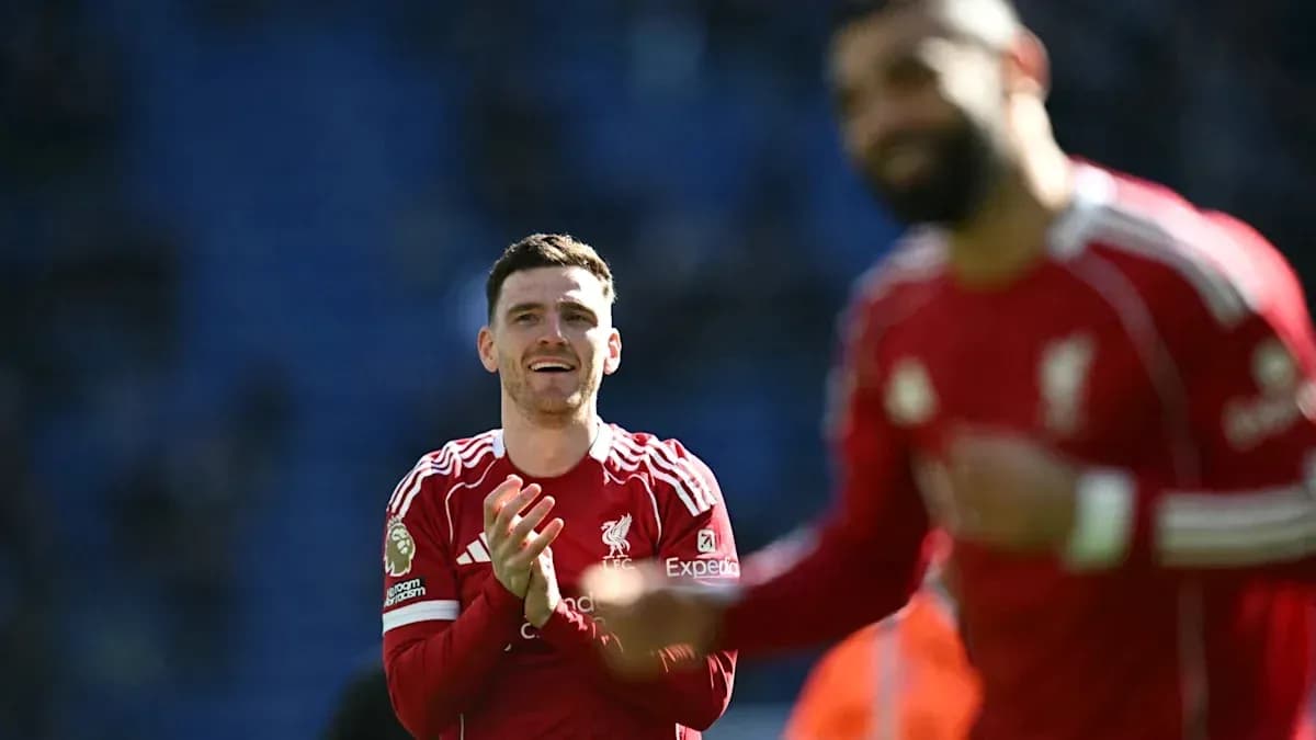 Liverpool players celebrating after a match victory