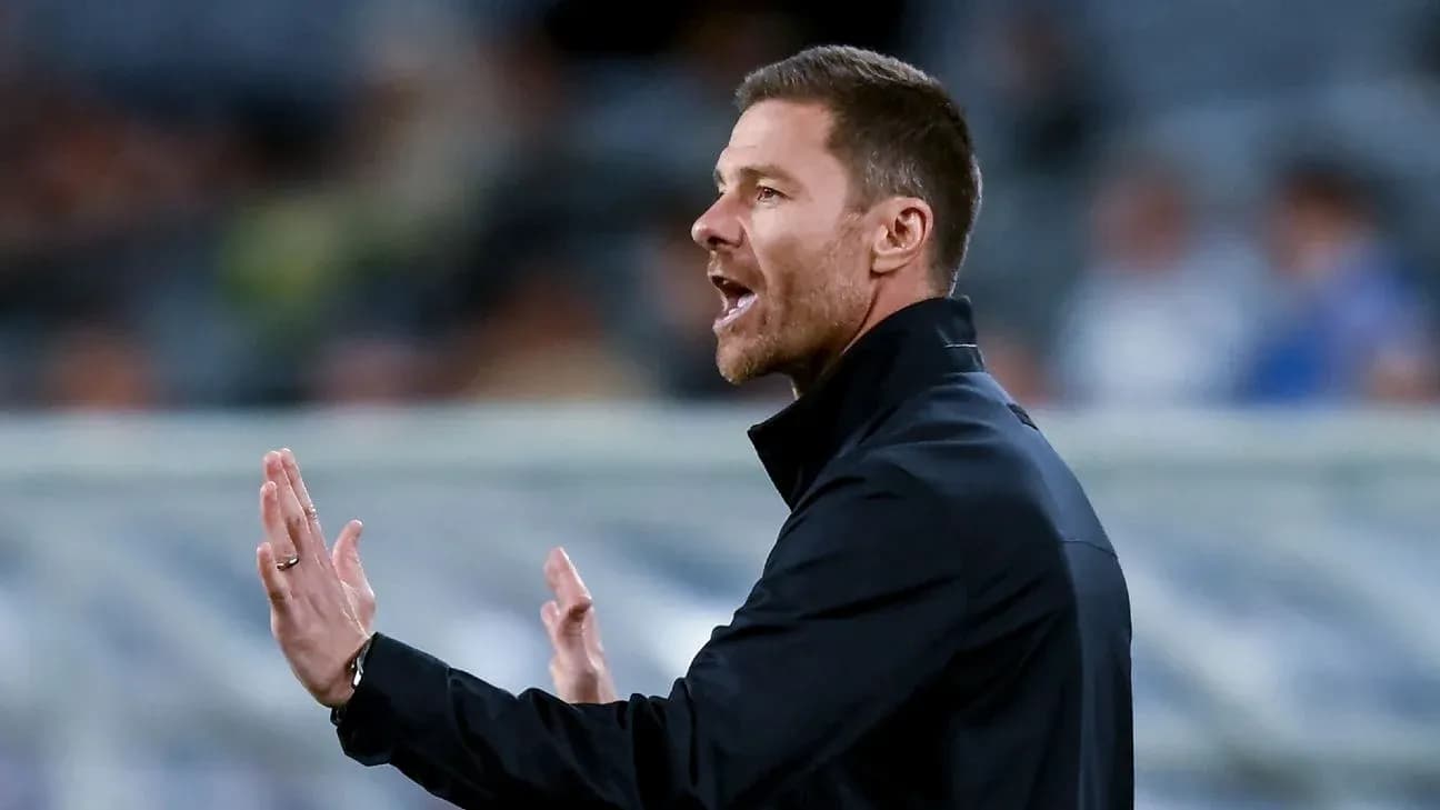 Coach gesturing during a match from the sidelines