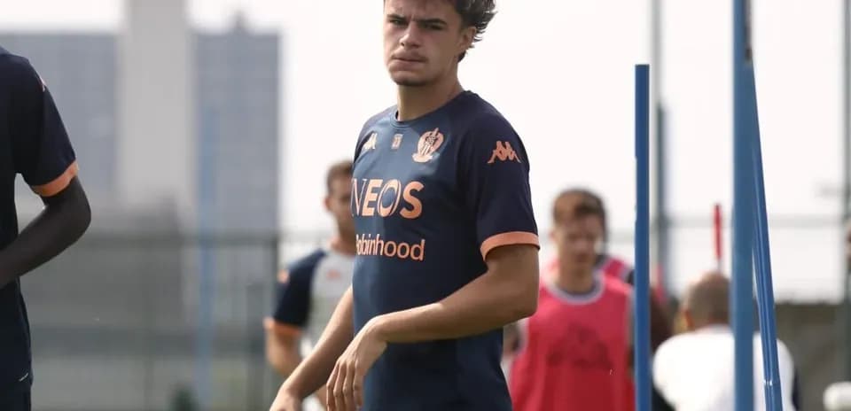 Player walking during training session on pitch