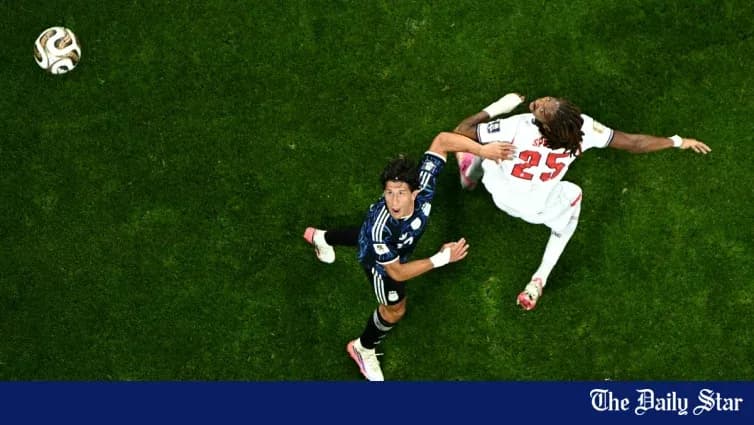 Player in blue and opponent colliding on field