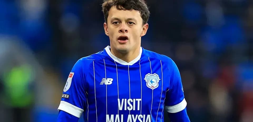 Player in blue jersey during a football match
