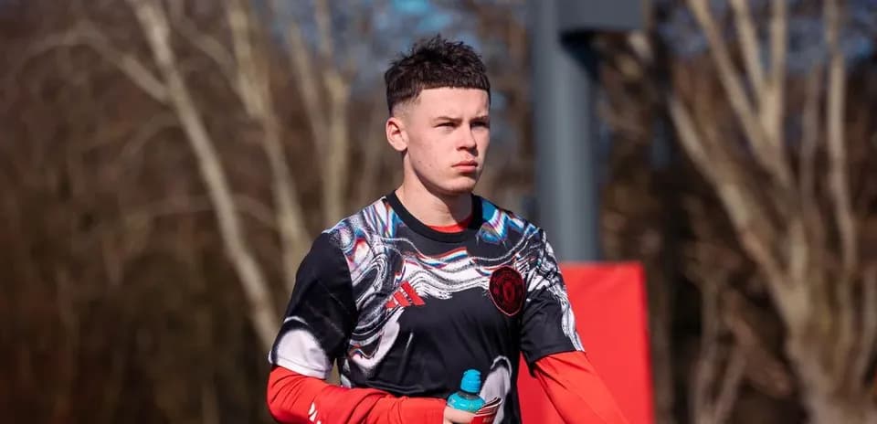 Player holding a water bottle during training session