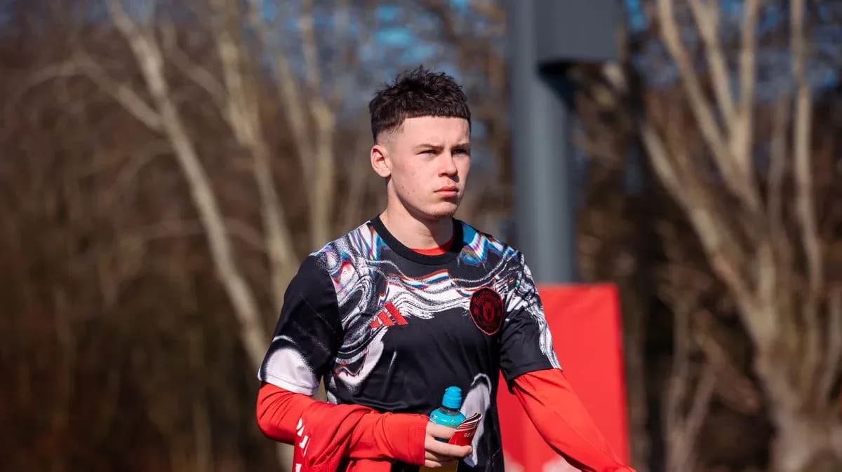 Player holding a water bottle during training session