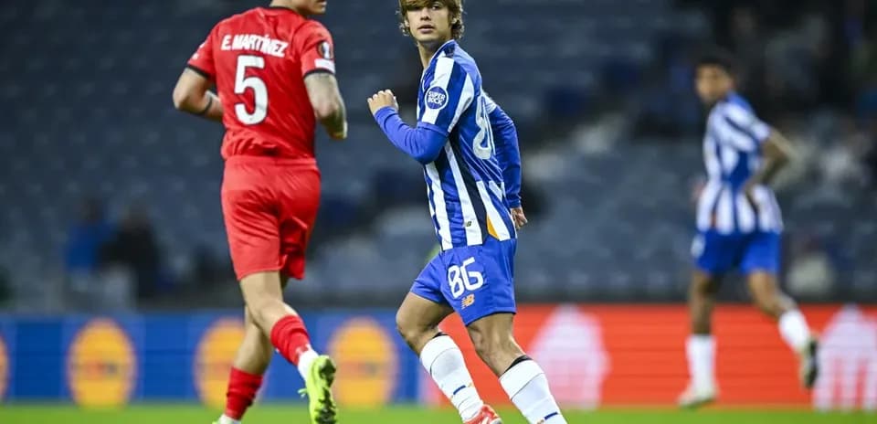 Player in blue kit running during match action