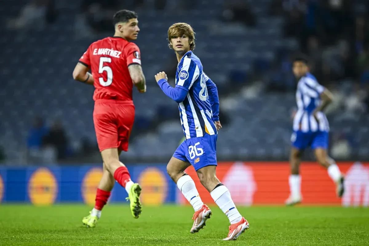 Player in blue kit running during match action