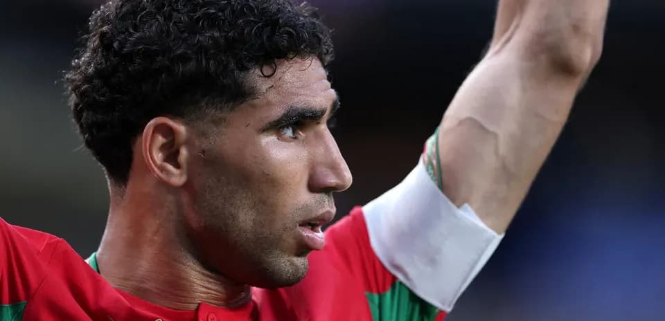 Player celebrating with arm raised during match
