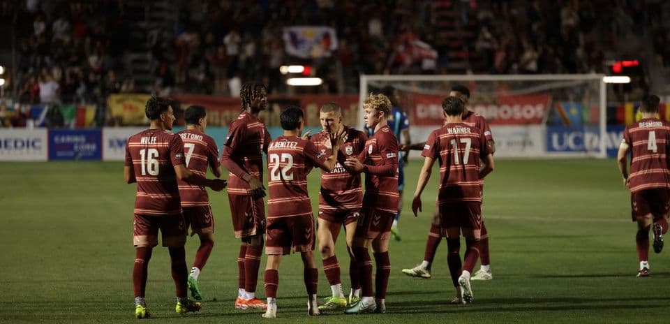 Colorado Springs players celebrating a goal