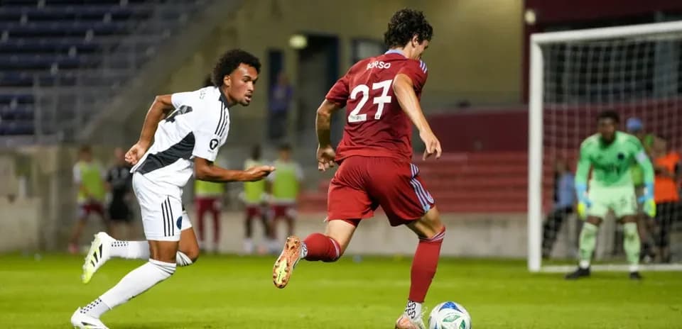 Chicago Fire II player dribbling past opponent