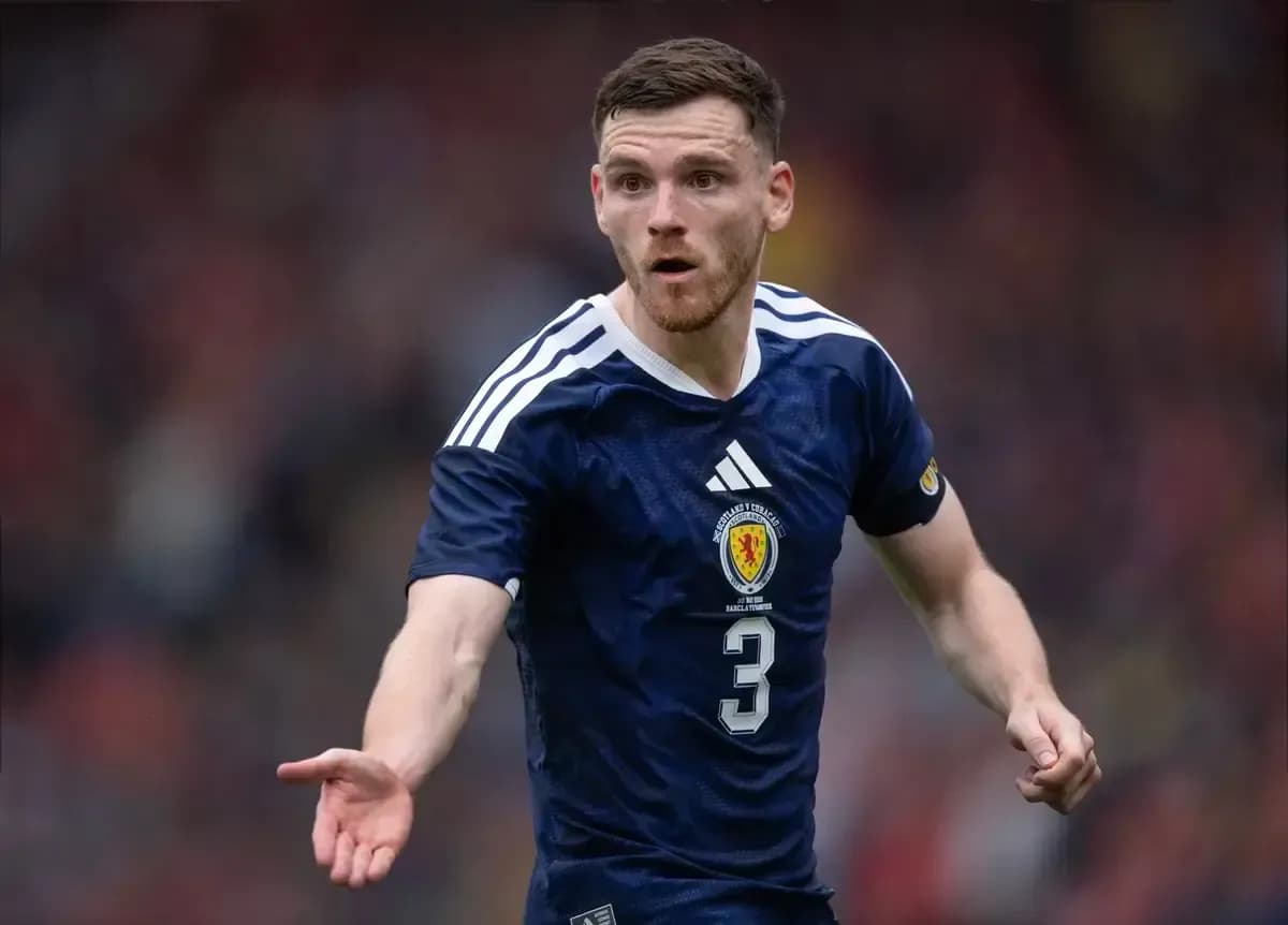 Scottish player gesturing during football match