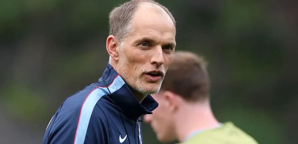 Coach speaking during training session outdoors