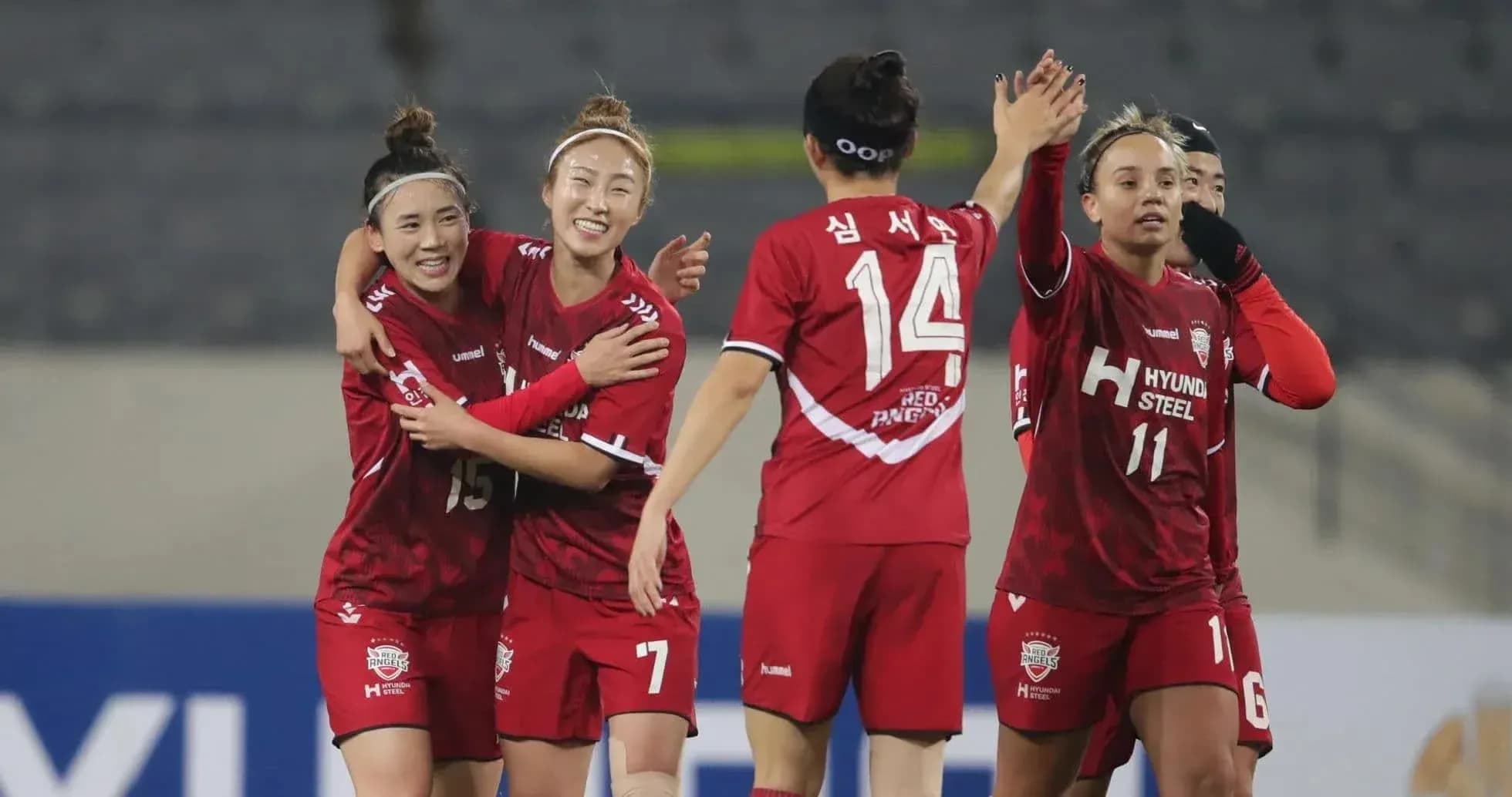Hwacheon KSPO W players celebrating a goal