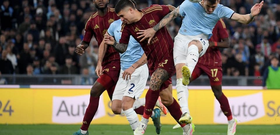 AS Roma players contesting the ball with Lazio