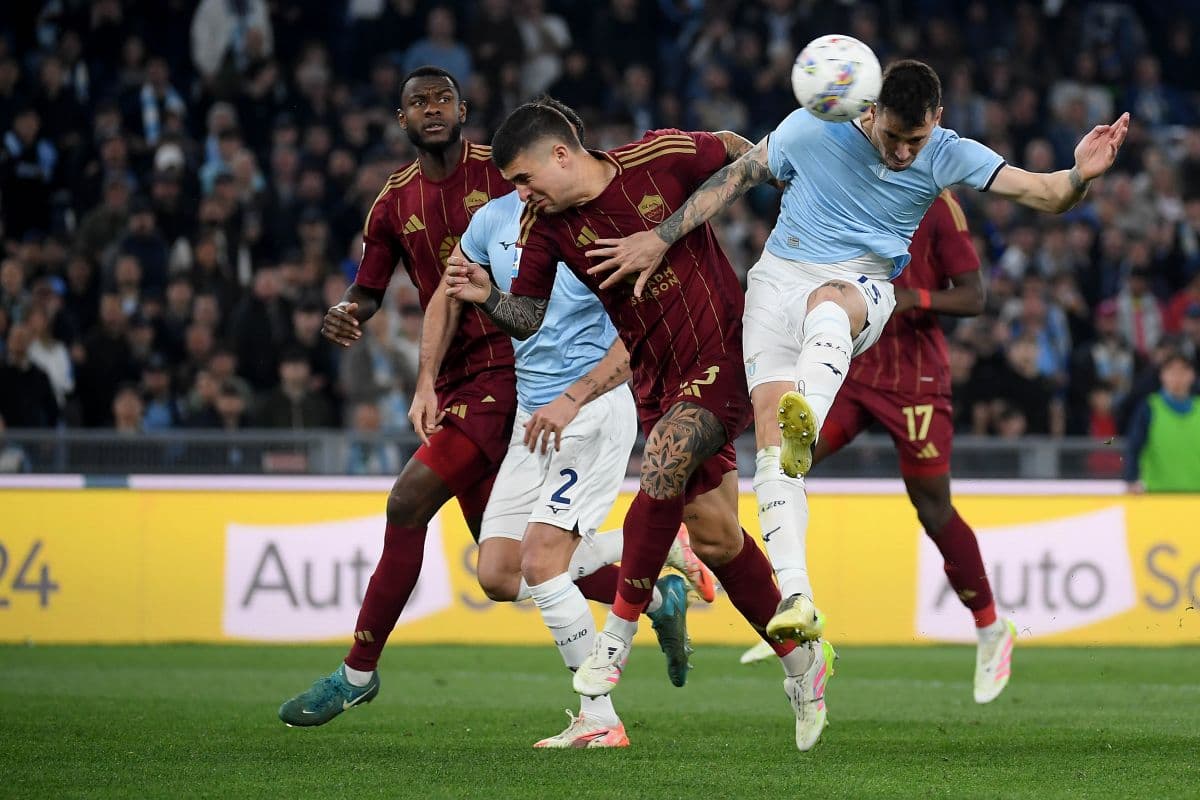 AS Roma players contesting the ball with Lazio