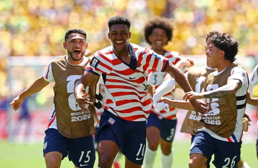 US players celebrating a goal during match