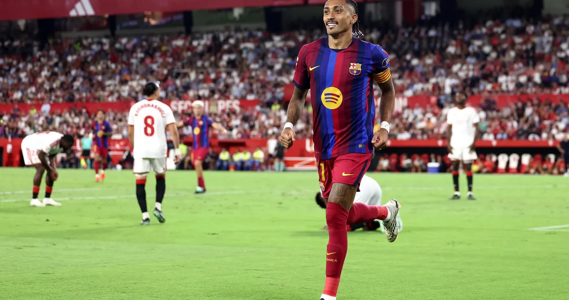 Player celebrating during Sevilla vs Barcelona match