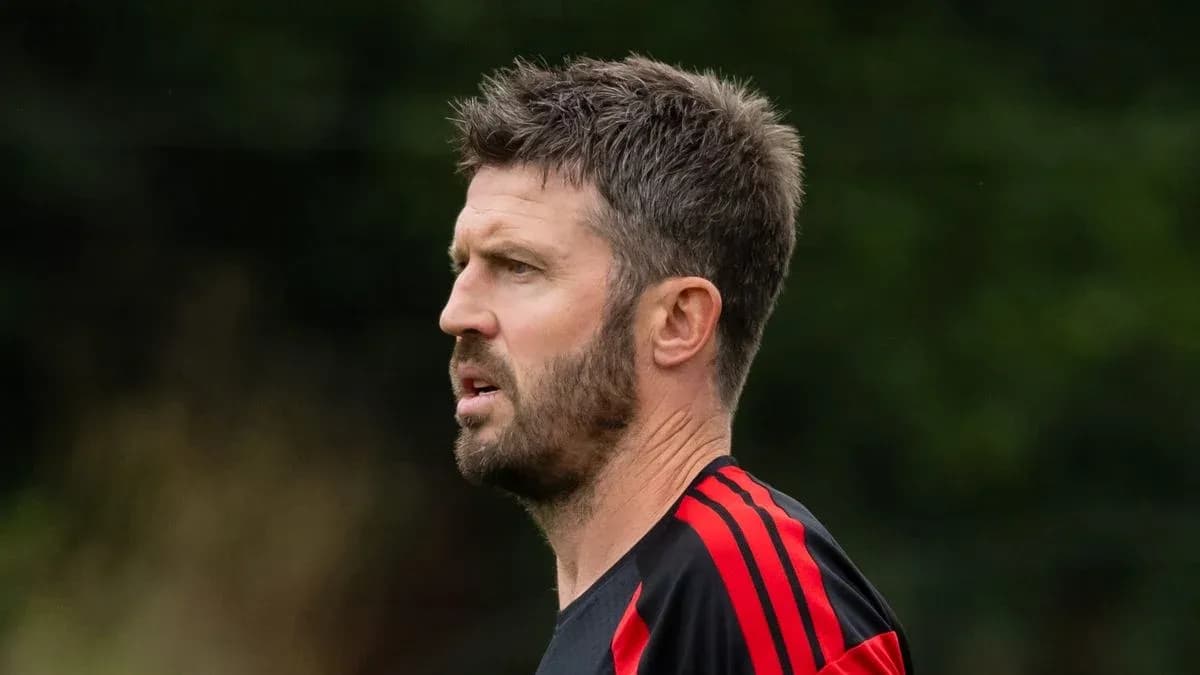 Coach observing during training session
