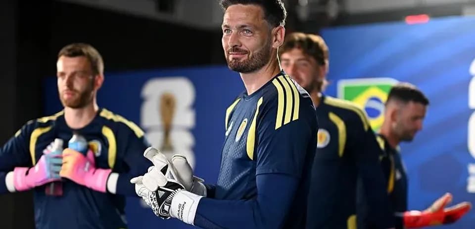 Goalkeeper preparing with teammates before match
