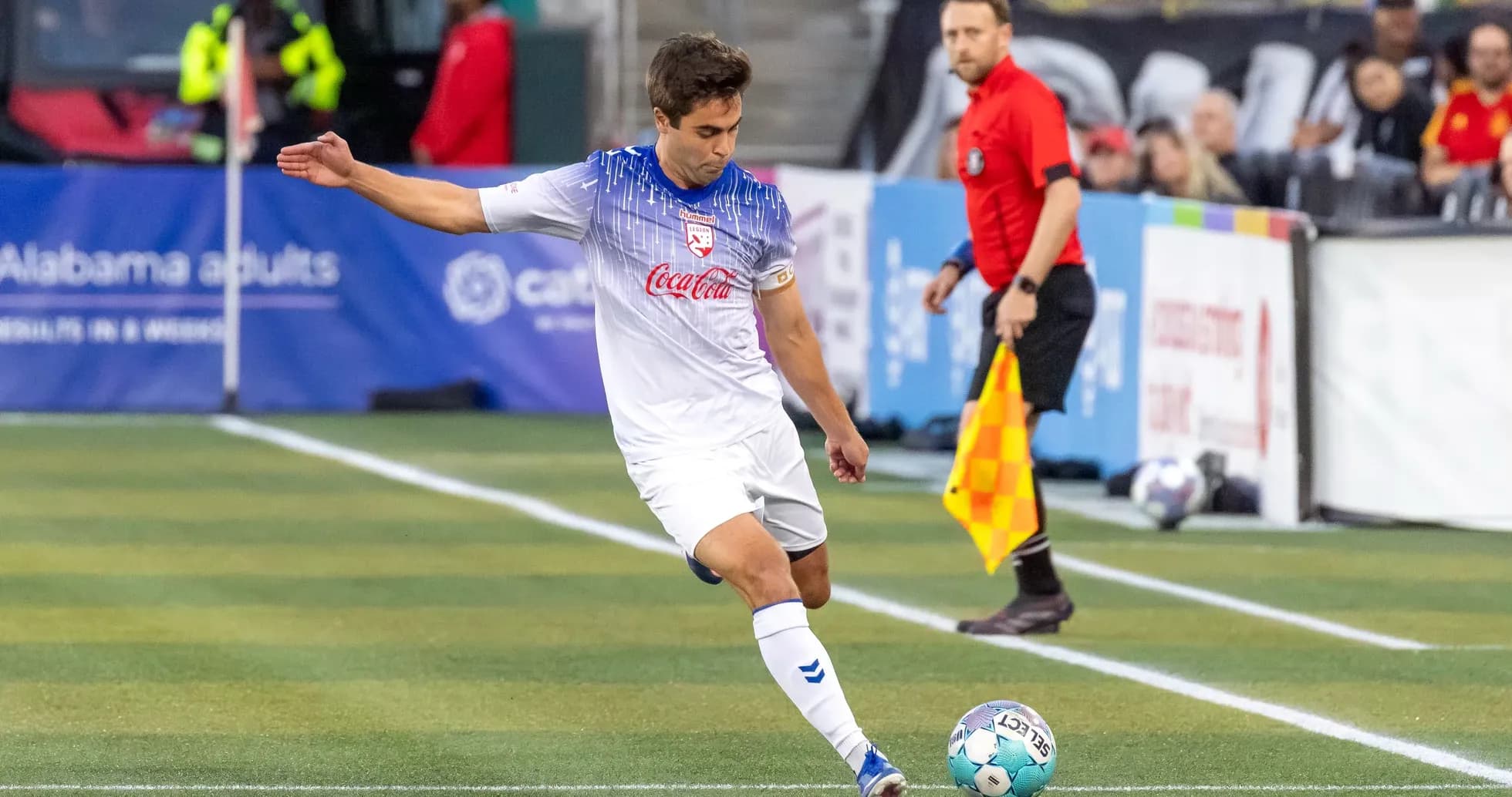Player taking a corner kick during match