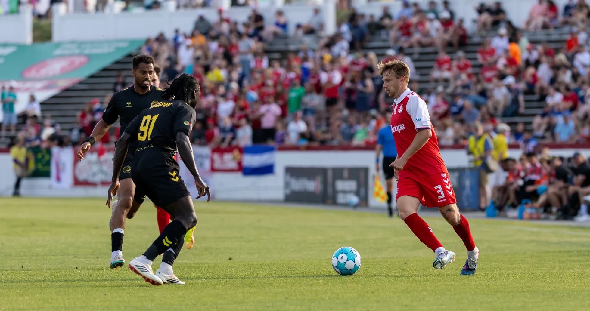 Charleston Battery player dribbling during match