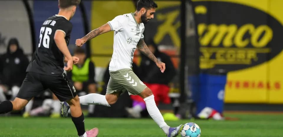 Player dribbling the ball during NY Cosmos match