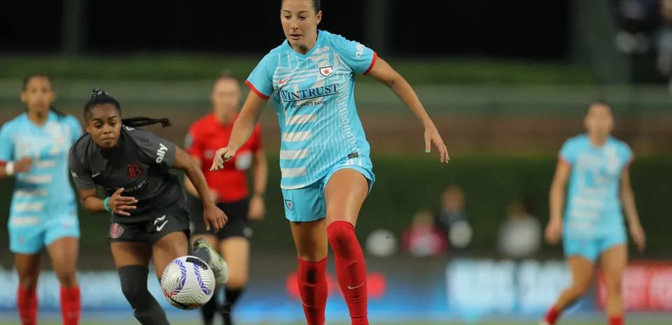 Player dribbling the ball during match action