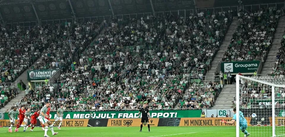 Ferencvarosi player taking a penalty kick