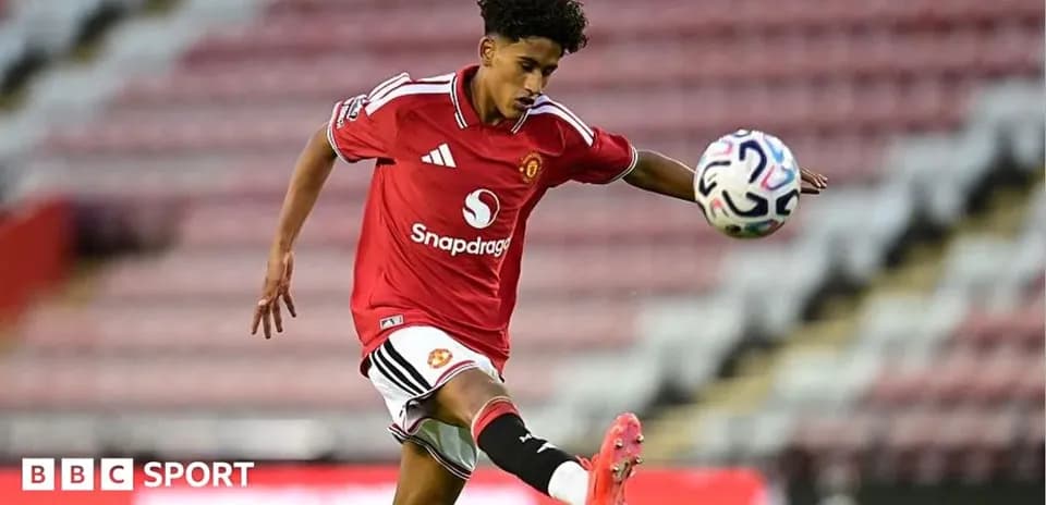 Player kicking ball during Manchester United match