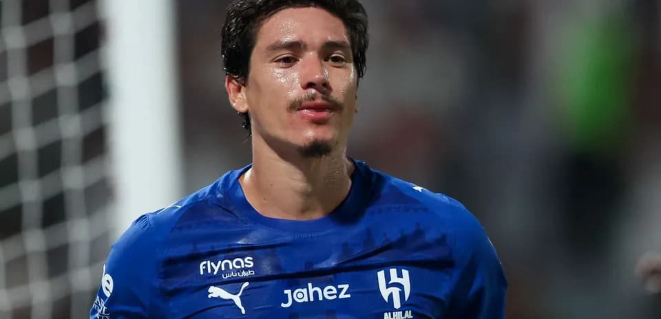 Player in blue jersey after a match
