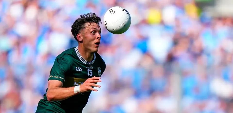 Player catching a ball during a GAA match
