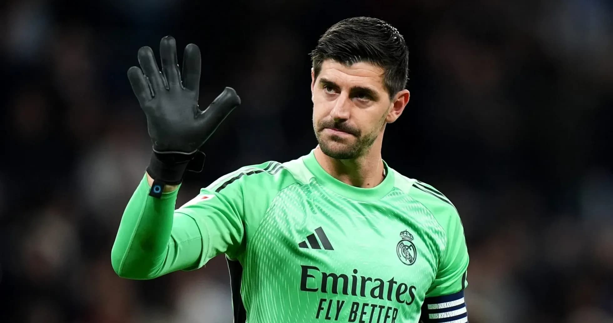 Thibaut Courtois waving as Real Madrid goalkeeper